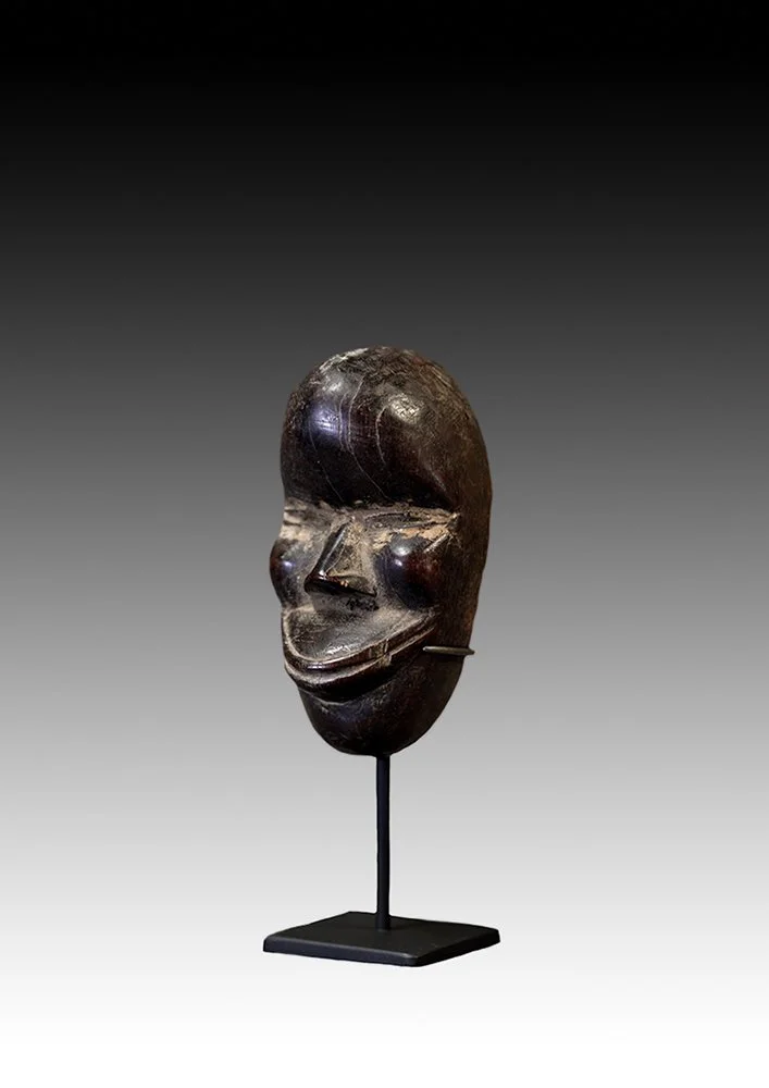 Dan mask with no holes for eyes or attachments.  www.gallerytribalart.com