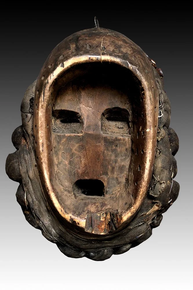 We mask, traditional wood mask carvings from the Ivory Coast.  www.gallerytribalart.com