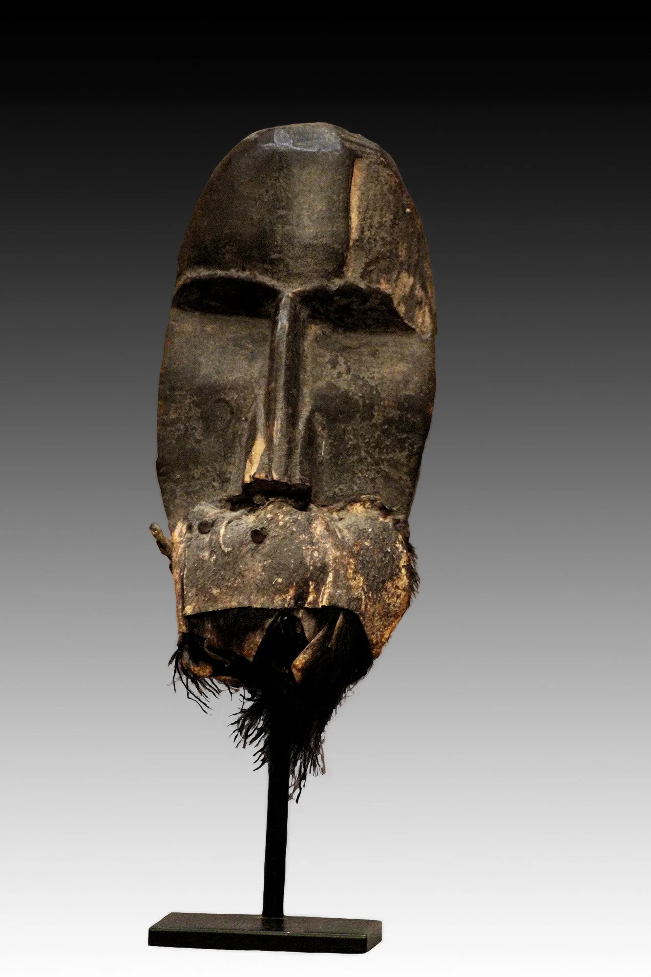 Dan mask, Ivory Coast known as a cold water spirit.  www.gallerytribalart.com