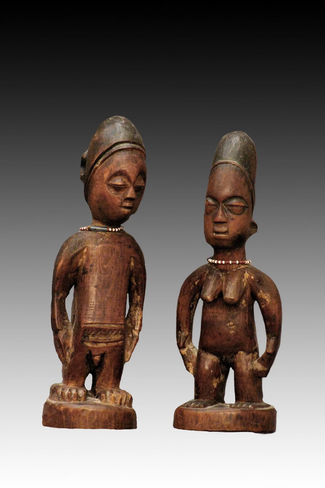Yoruba Ibeji twins are carved statues called ere Ibeji.  www.gallerytribalart.com