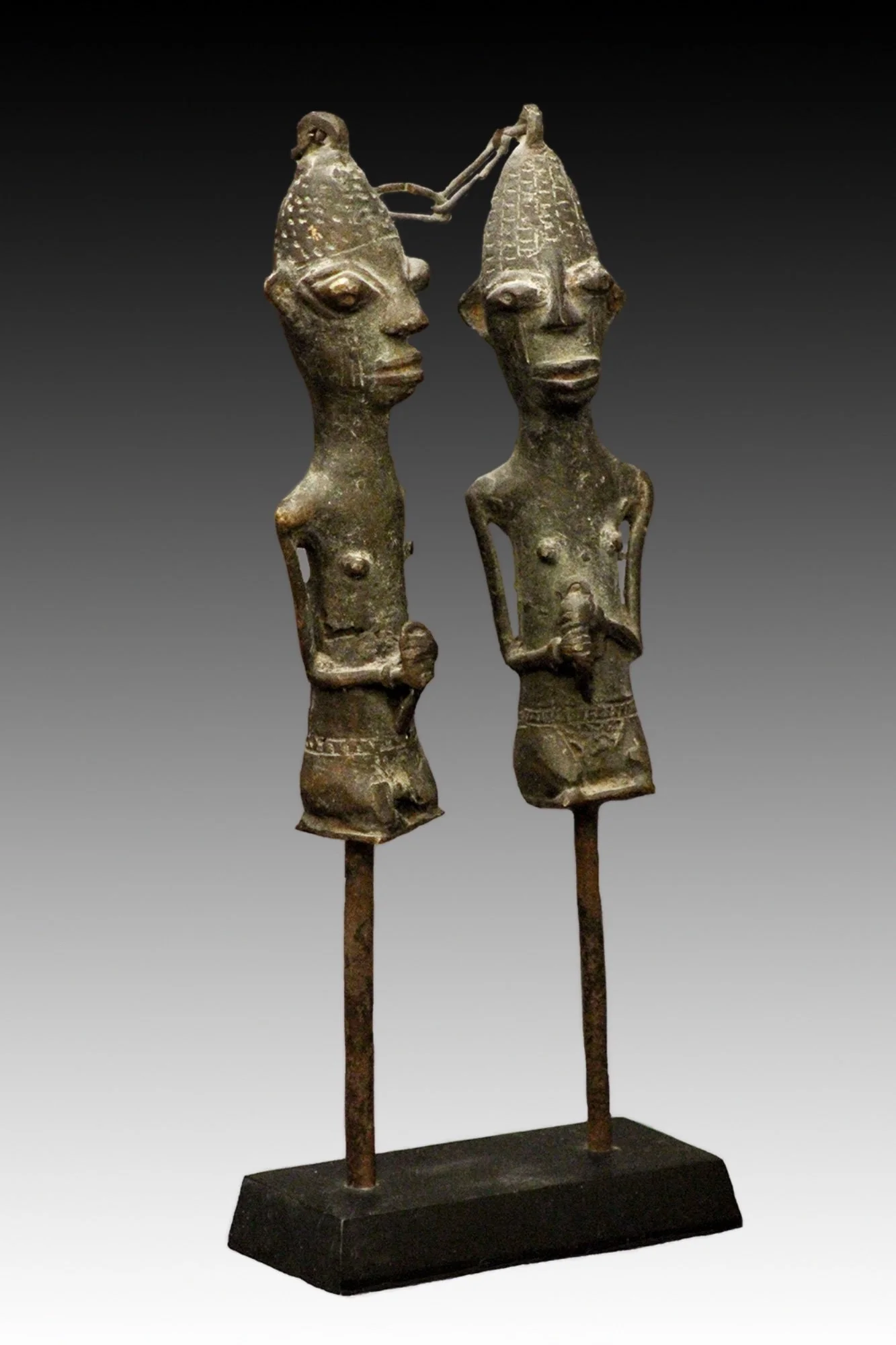 Ogboni Brass figures symbolize the original founding couple of the Ogboni culture.  www.gallerytribalart.com.