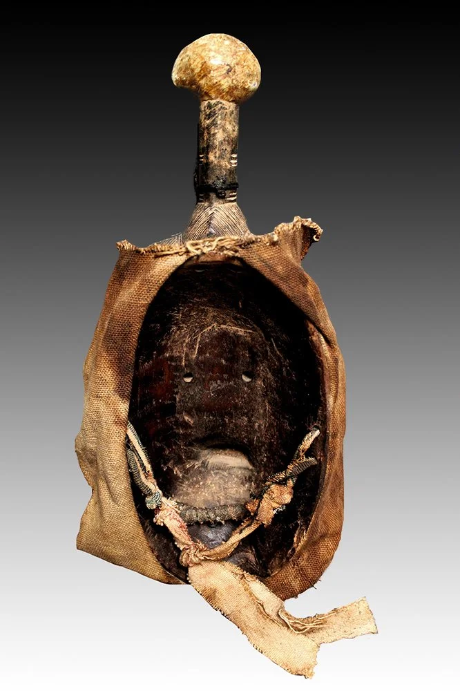 Guro mask has leather pouch and bite-bar.  www.gallerytribalart.com