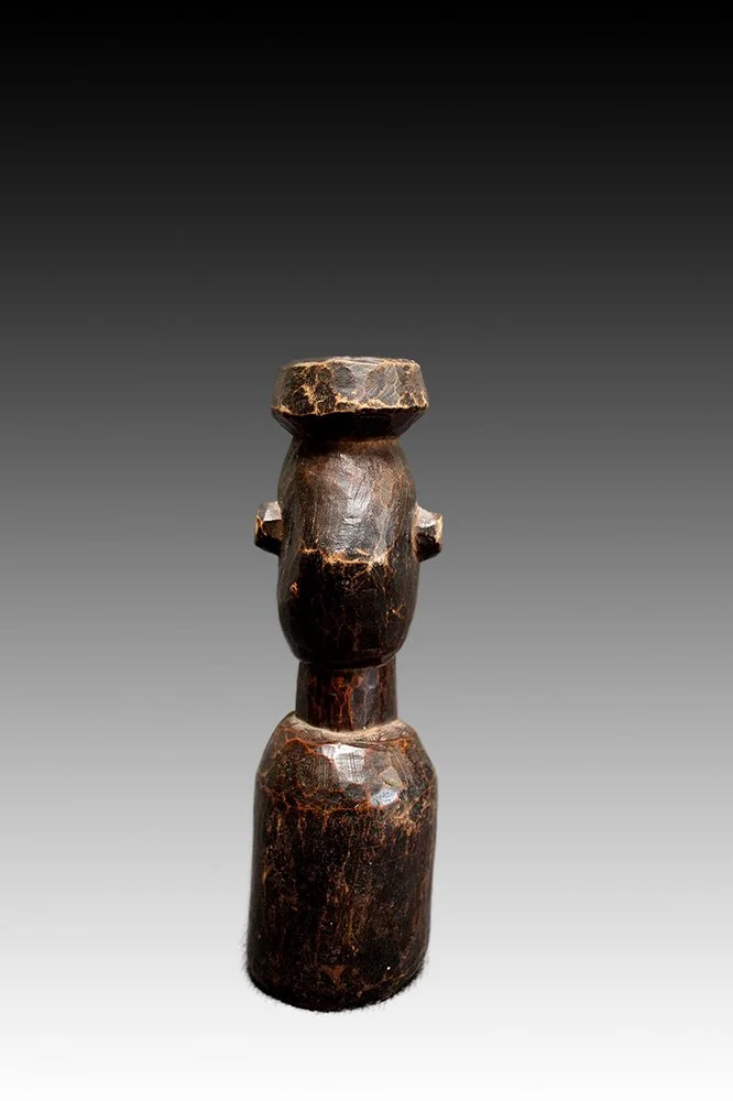 Yaka slit drum with rich dark brown paina.  www.gallerytribalart.com
