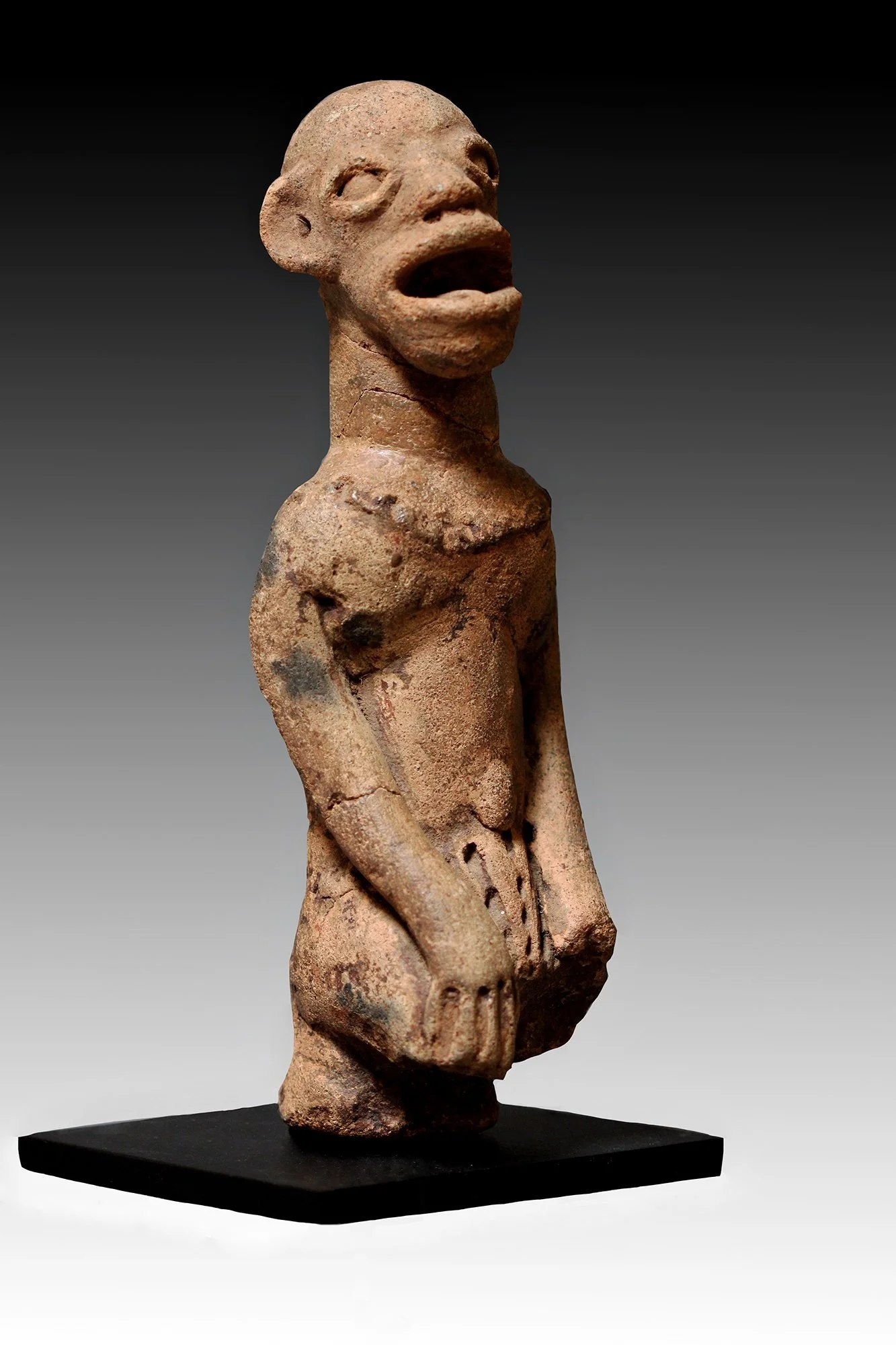 Koma terracotta figures were found in earth mounds and stone circles by farmers and villagers.  www.gallerytribalart.com