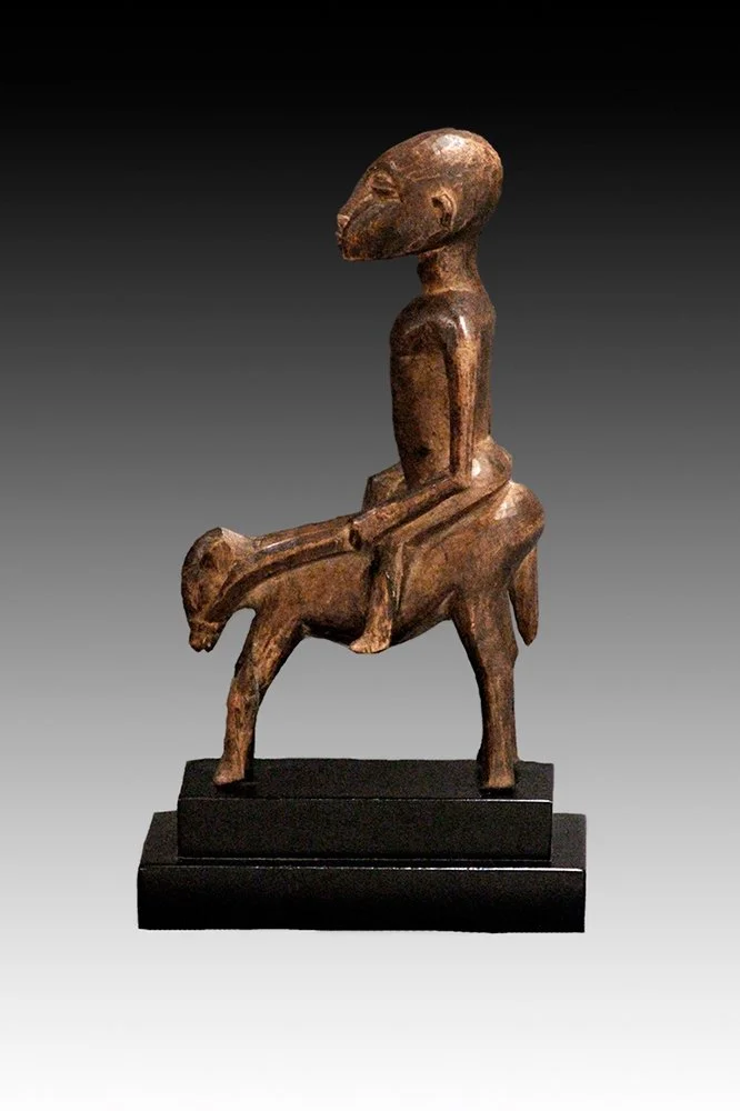 Senufo horse and rider, the man is much larger than the horse.  www.gallerytribalart.com