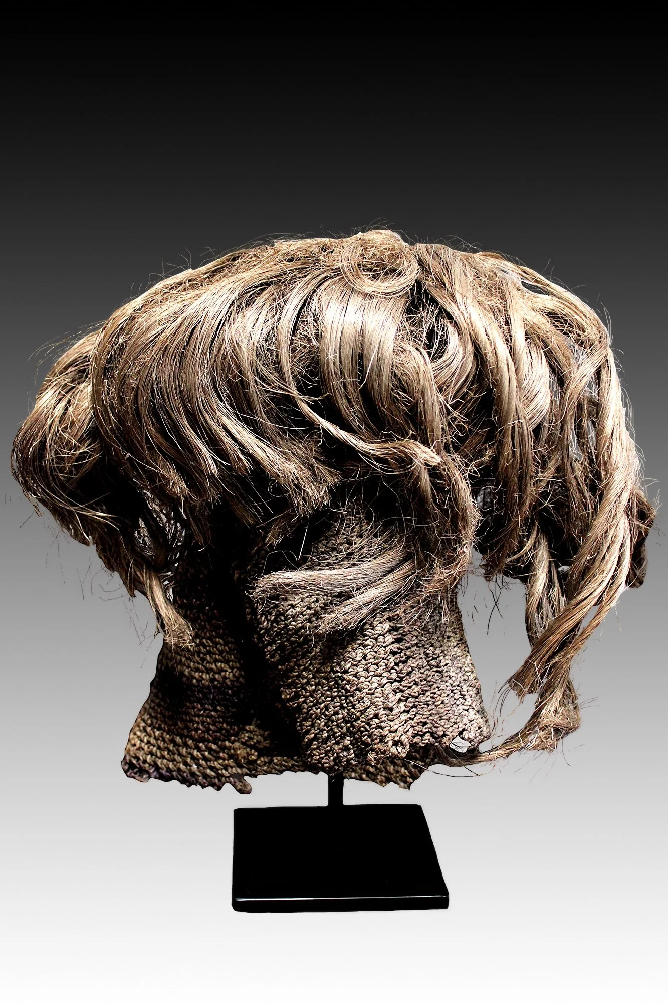 Luvale mask, wearing a fiber and sisal coiffure and portion of knitted, cotton costume.  www.gallerytribalart.com
