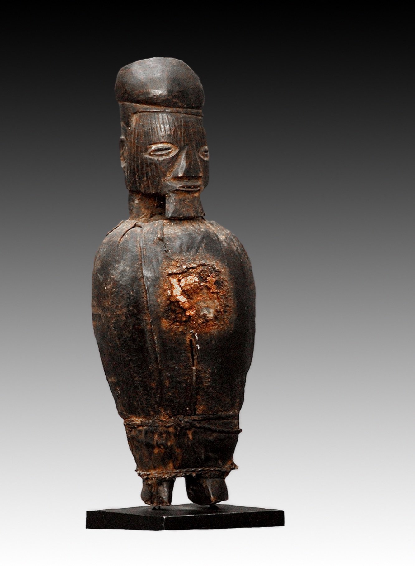 Teke figure has a mass of ingredients called “bonga” that was inserted into the abdominal cavity.  www.gallerytribalart.com