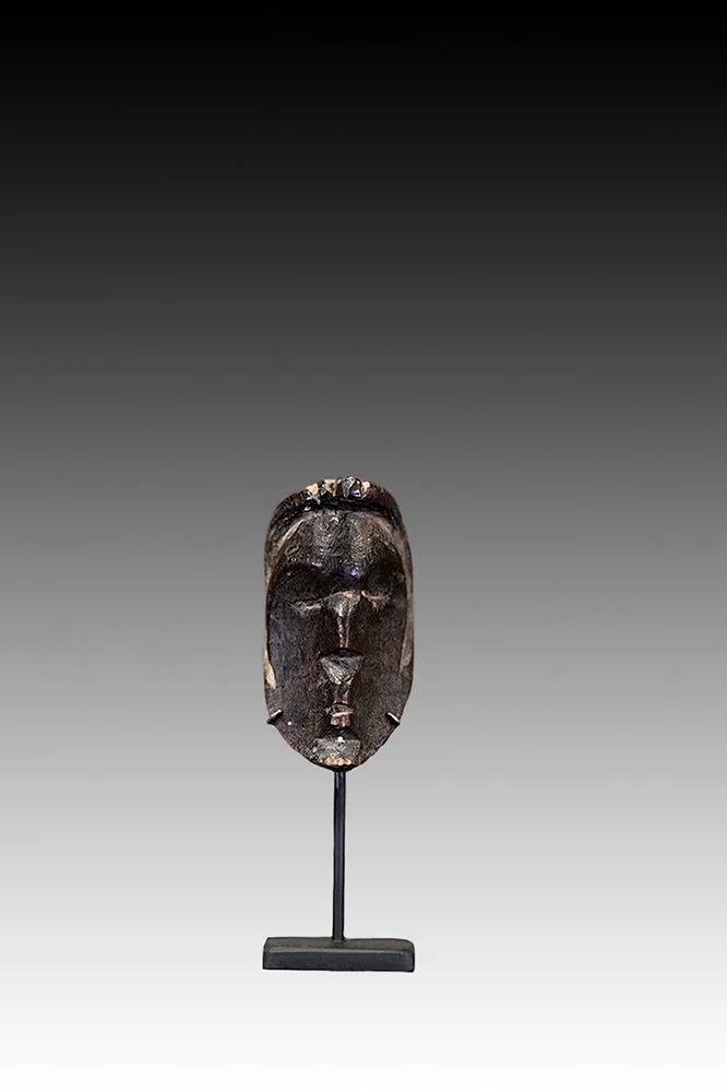 Small African passport masks, Ivory Coast.  www.gallerytribalart.com