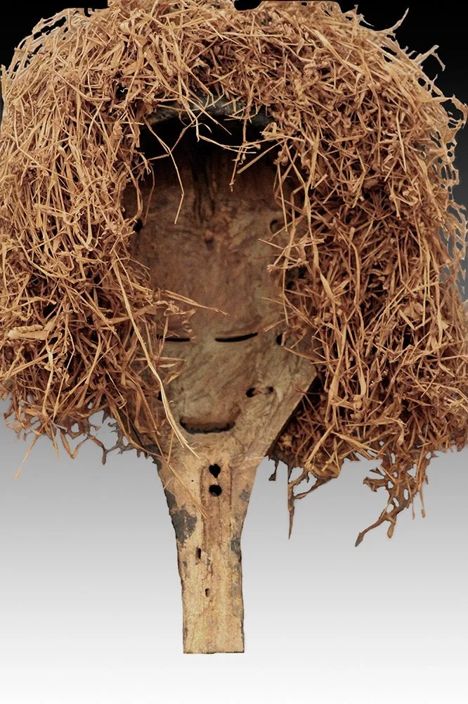 Yaka mask with handle and raffia.  www.gallerytribalart.com