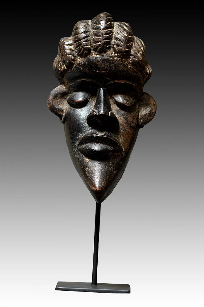 Bassa mask with concave shape and jutting chin.  www.gallerytribalart.com