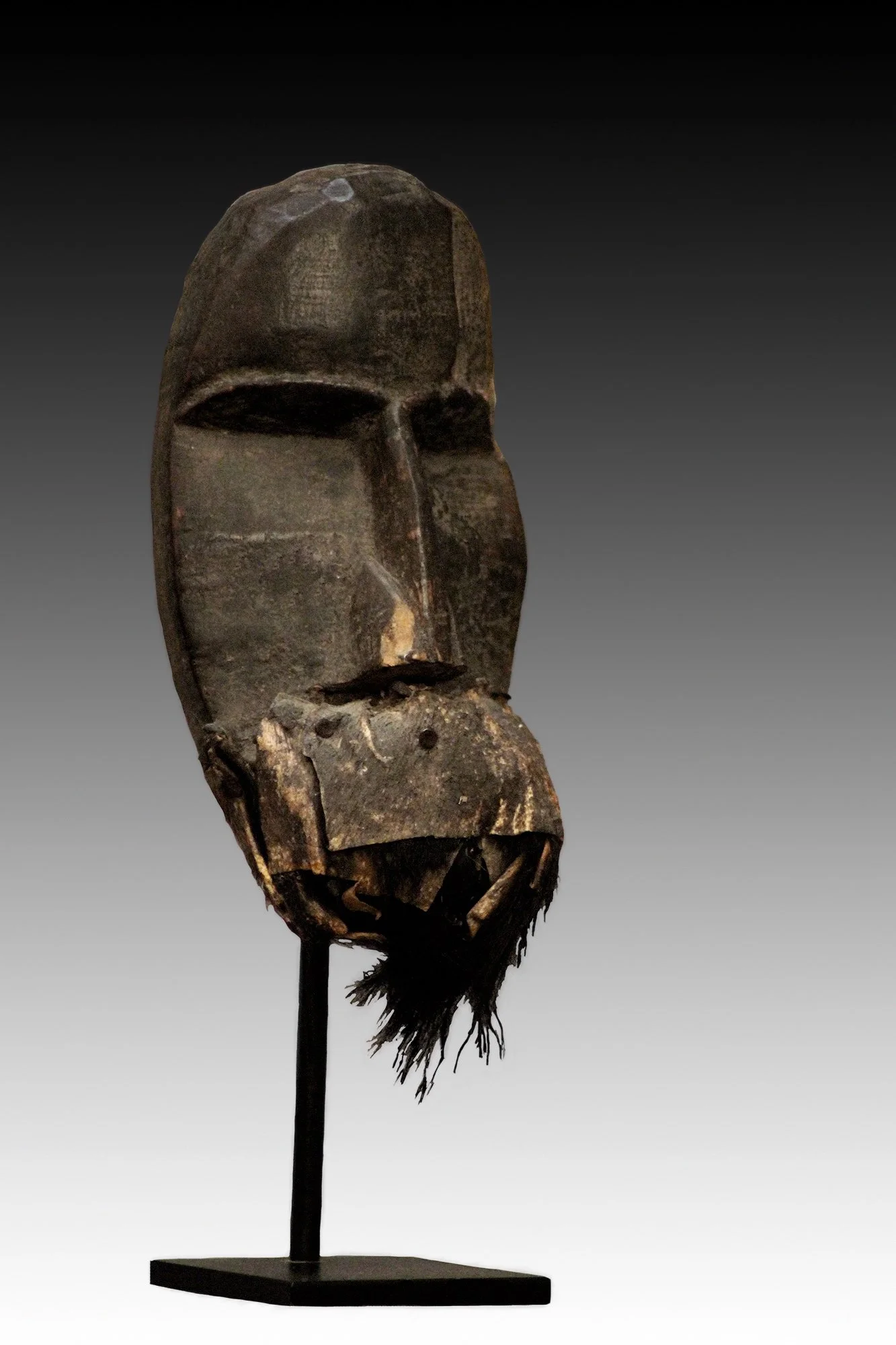 Dan mask with animal hide and fur.  www.gallerytribalart.com