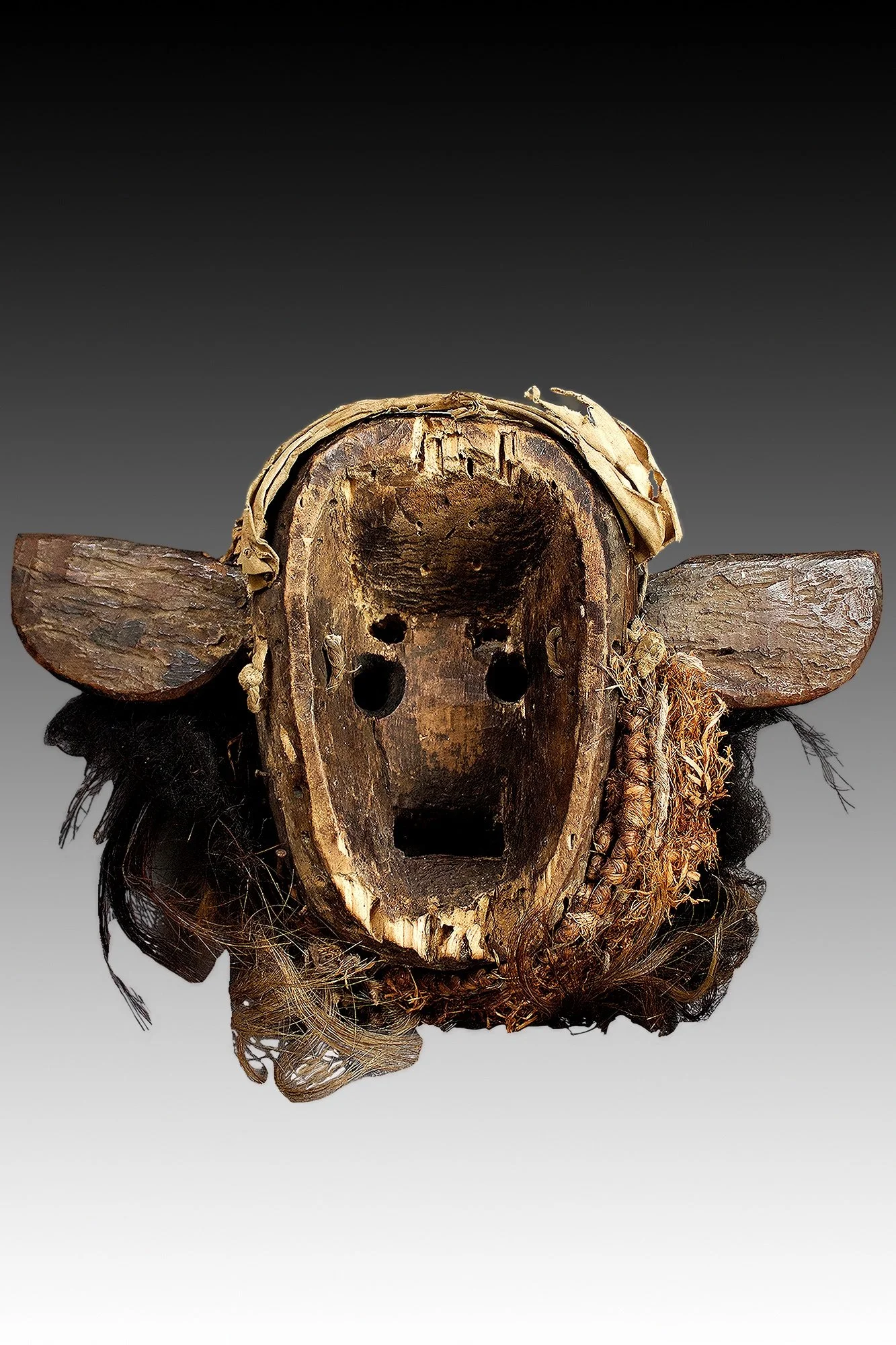 Guere mask, back view showing animal hide and fur.  www.gallerytribalart.com