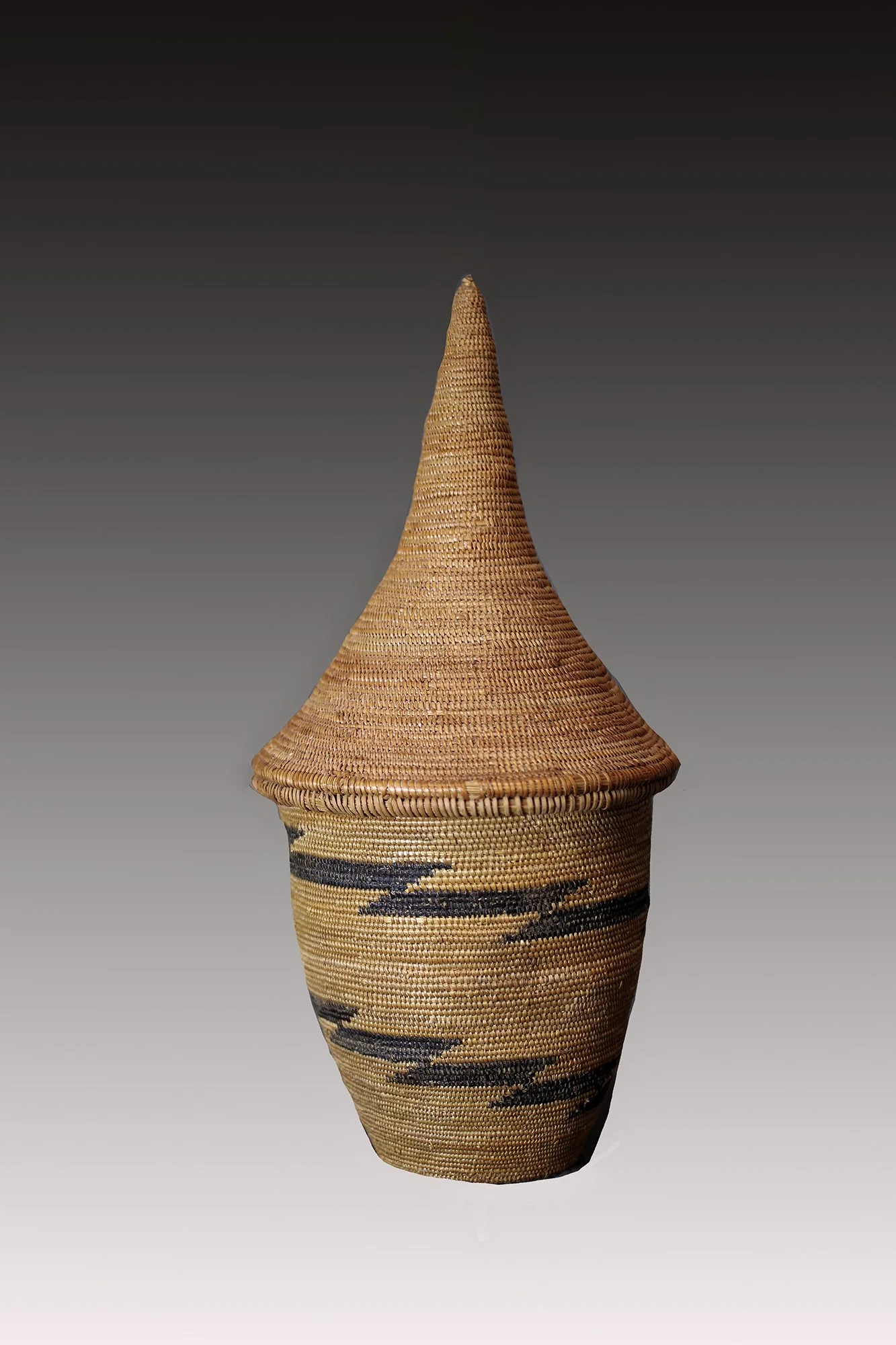 Tutsi basket TTutsi baskets are made from native grasses, reeds and sisal fiber,  patterned with spiral lines, zigzags and triangles.  www.gallerytribalart.com