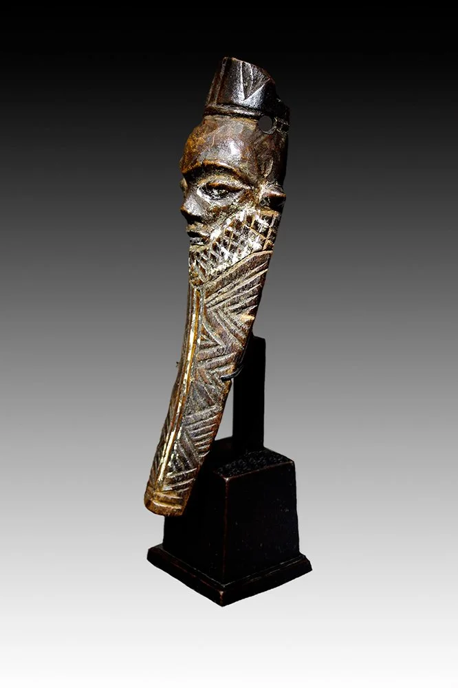 Pende Ikhoko pendant, finely incised African wood carving.  www.gallerytribalart.com