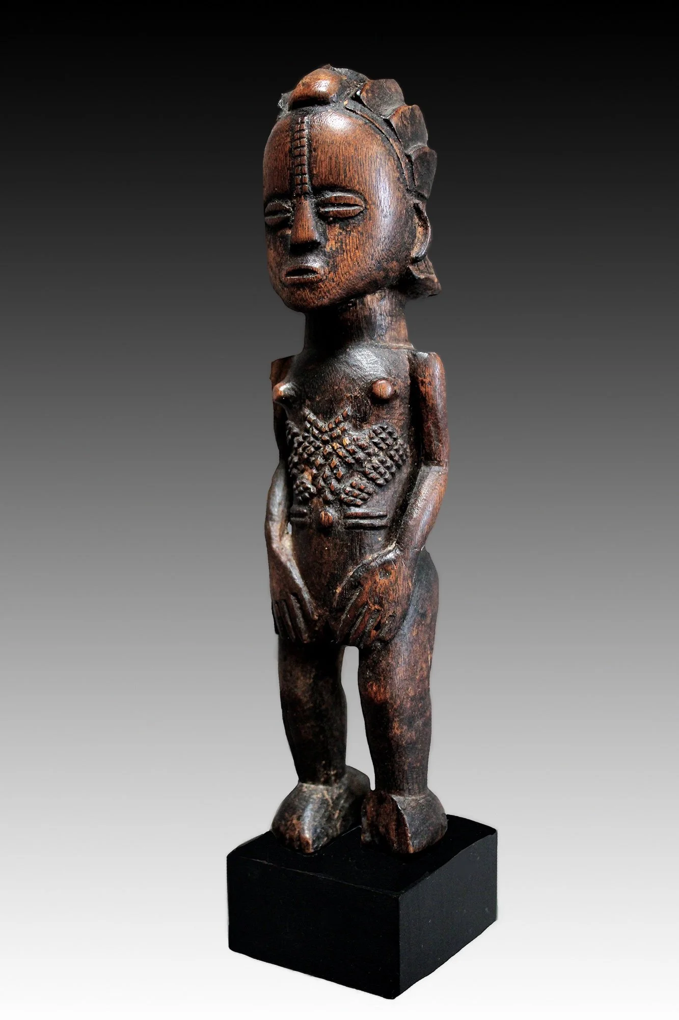 Luba figure, fine scarification and rich patina.  www.gallerytribalart.com