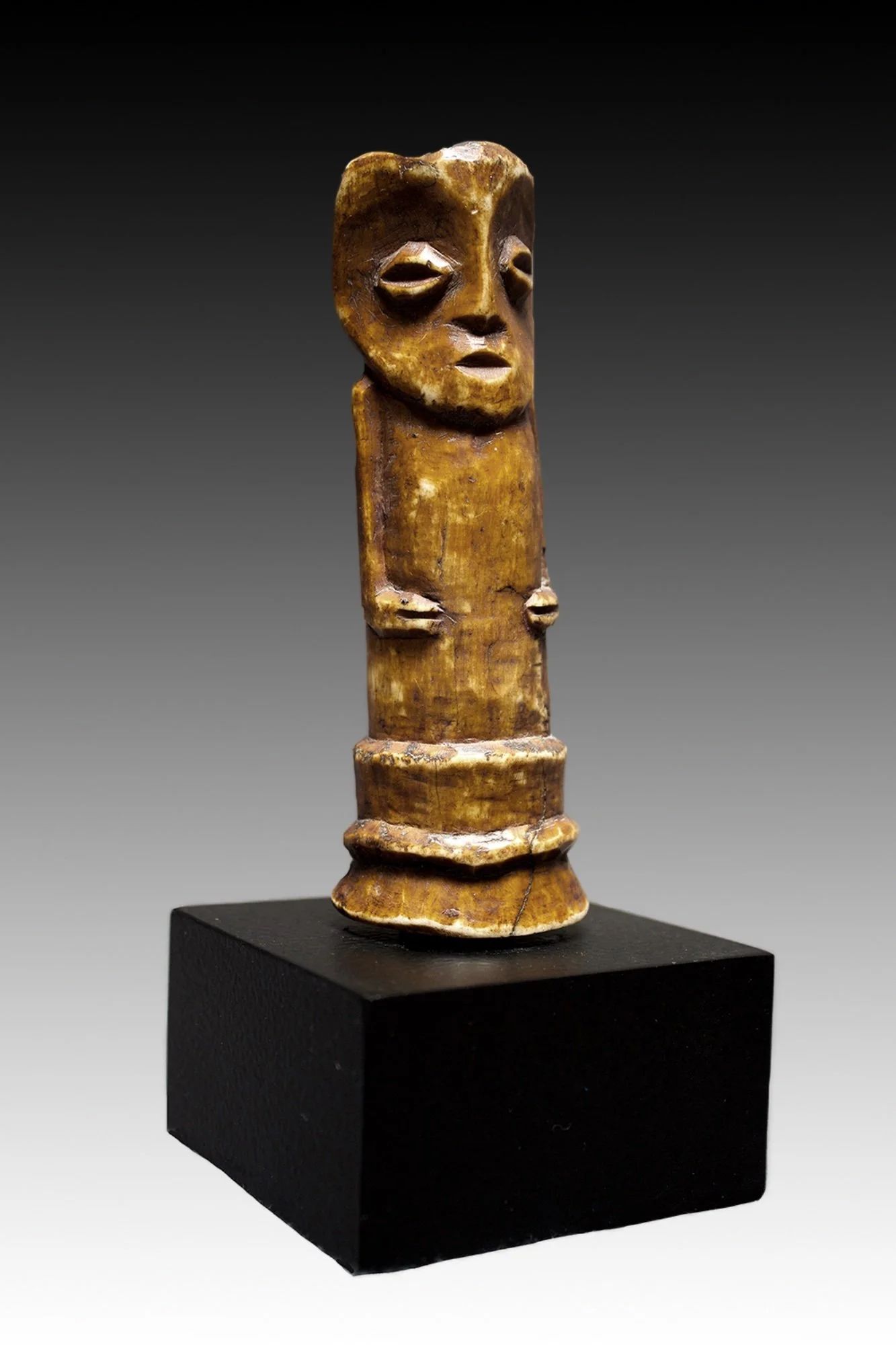 Rare Lega bone figure was owned by a high ranking member of the Bwami secret society.   www.gallerytribalart.com