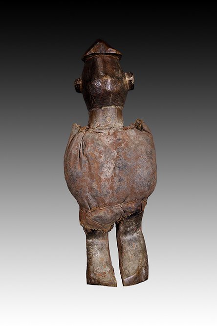 Yaka figure with encrusted patina of red powder called tukula.  www.gallerytribalart.com