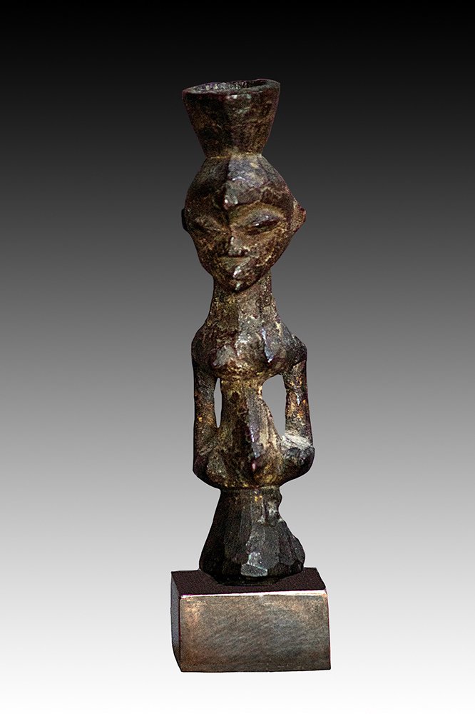 Luba fetish figure is a finely carved half figure that was used for protection, healing and witchcraft.  www.gallerytribalart.com