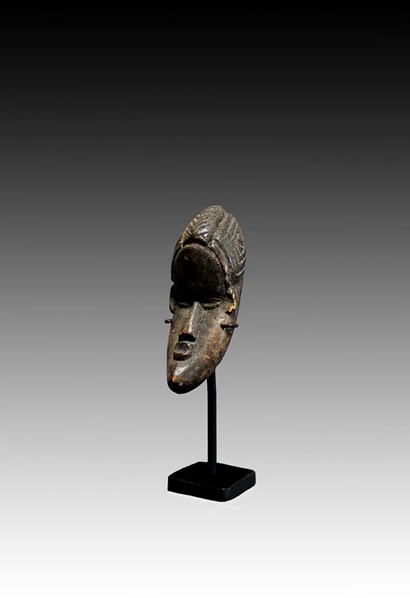Bassa passport mask with eleborate hairstyle.  www.gallerytribalart.com