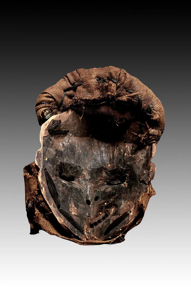Pende mask with adze marks and fiber attachments.  www.gallerytribalart.com