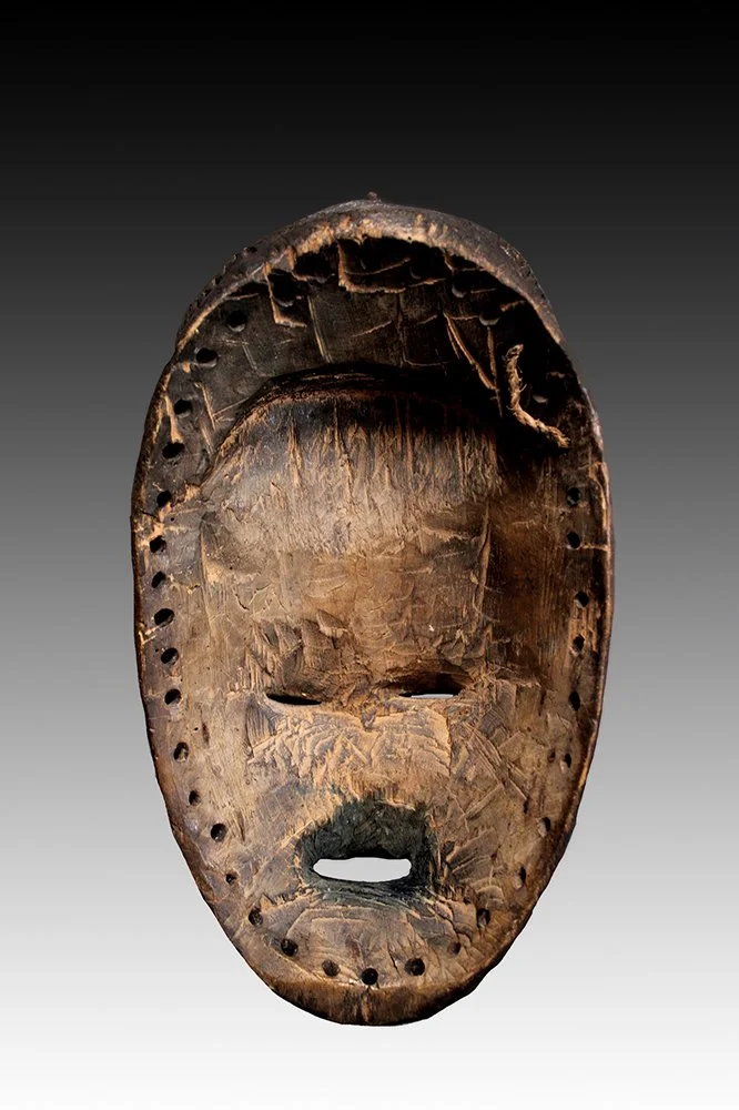 Bete Guro mask back view showing well worn patina from use.  www.gallerytribalart.com