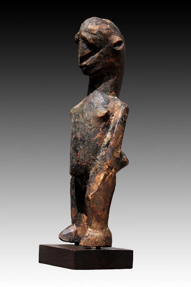 Lobi miniature figure used for protection against illness and misfortune.  www.gallerytribalart.com