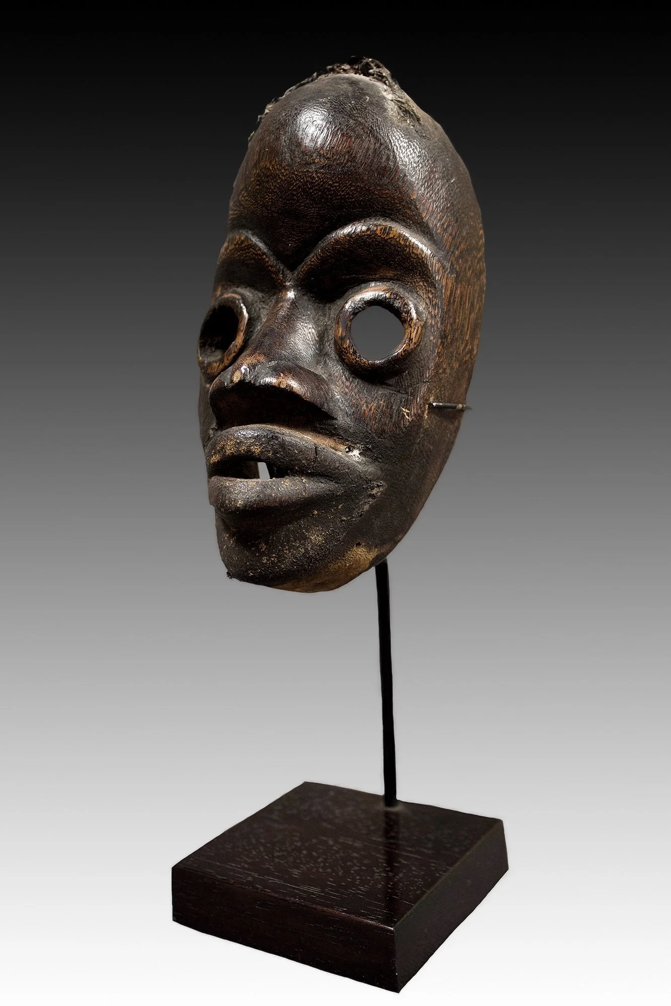 Dan mask, used in foot racing competitions by young men of the village during the dry season.  www.gallerytribalart.com