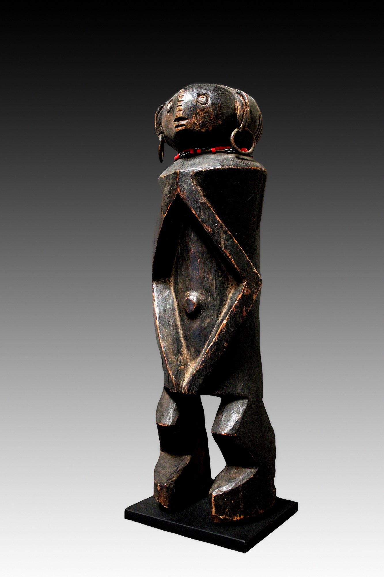 Band figure was a protective spirit.  www.gallerytribalart.com