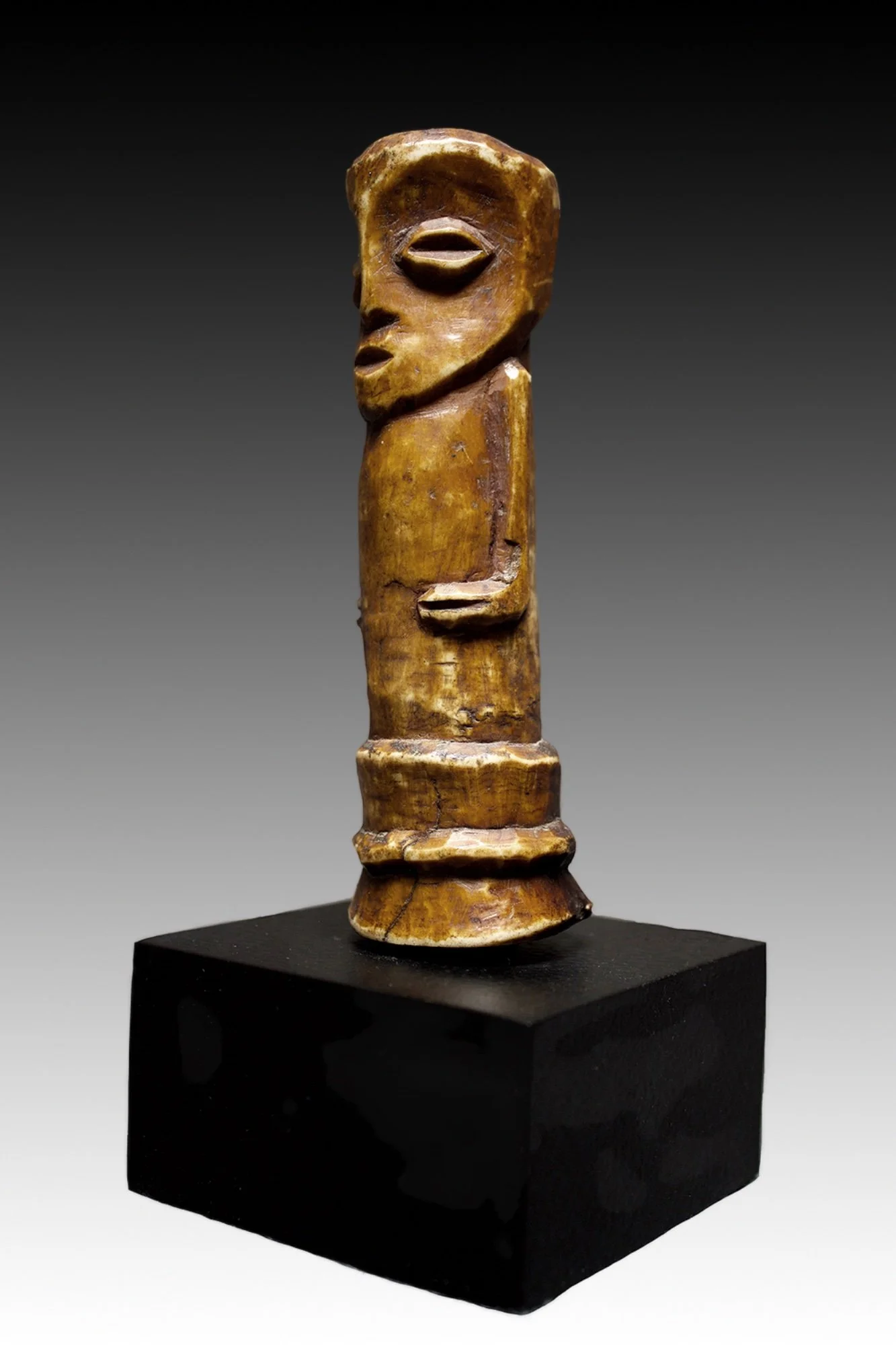 Lega figure, authentic African bone carvings.  www.gallerytribalart.com