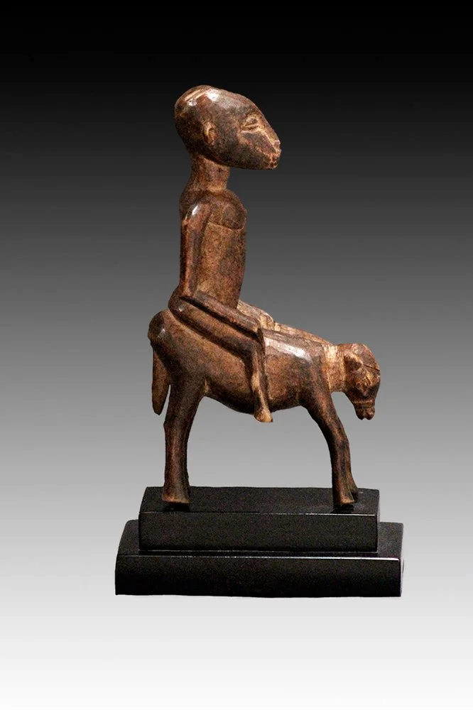 Senufo equestrian, rider has a large, elongated head.  www.gallerytribalart.com