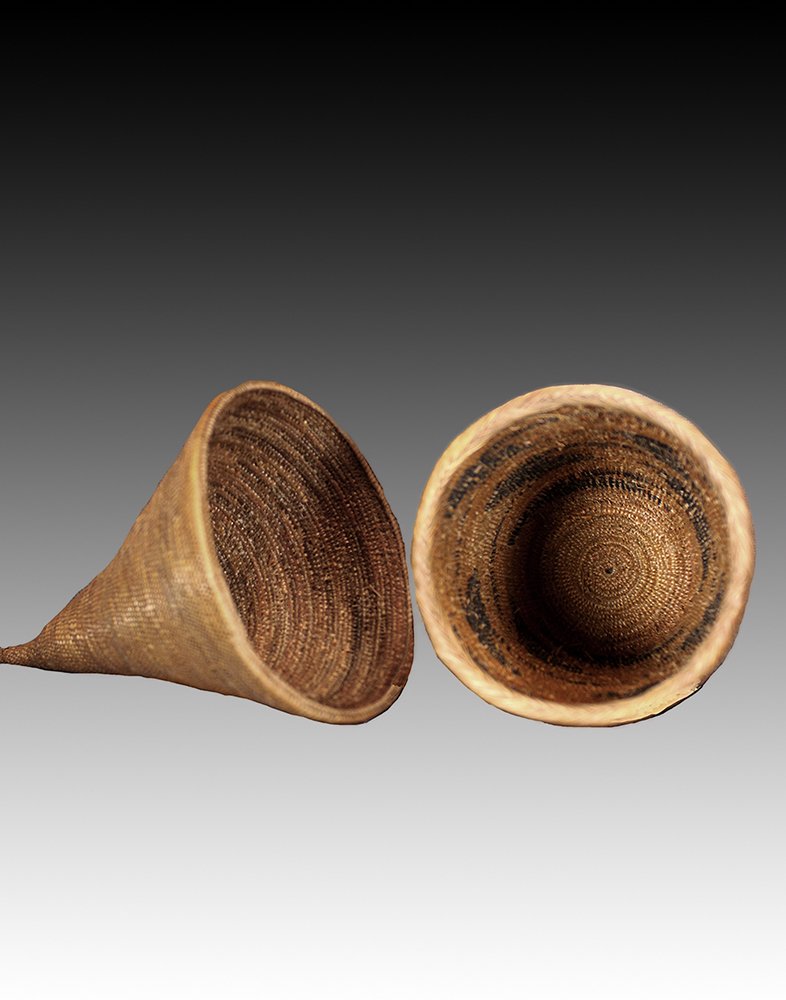Tutsi basket bottom view showing tight coiling.  www.gallerytribalart.com