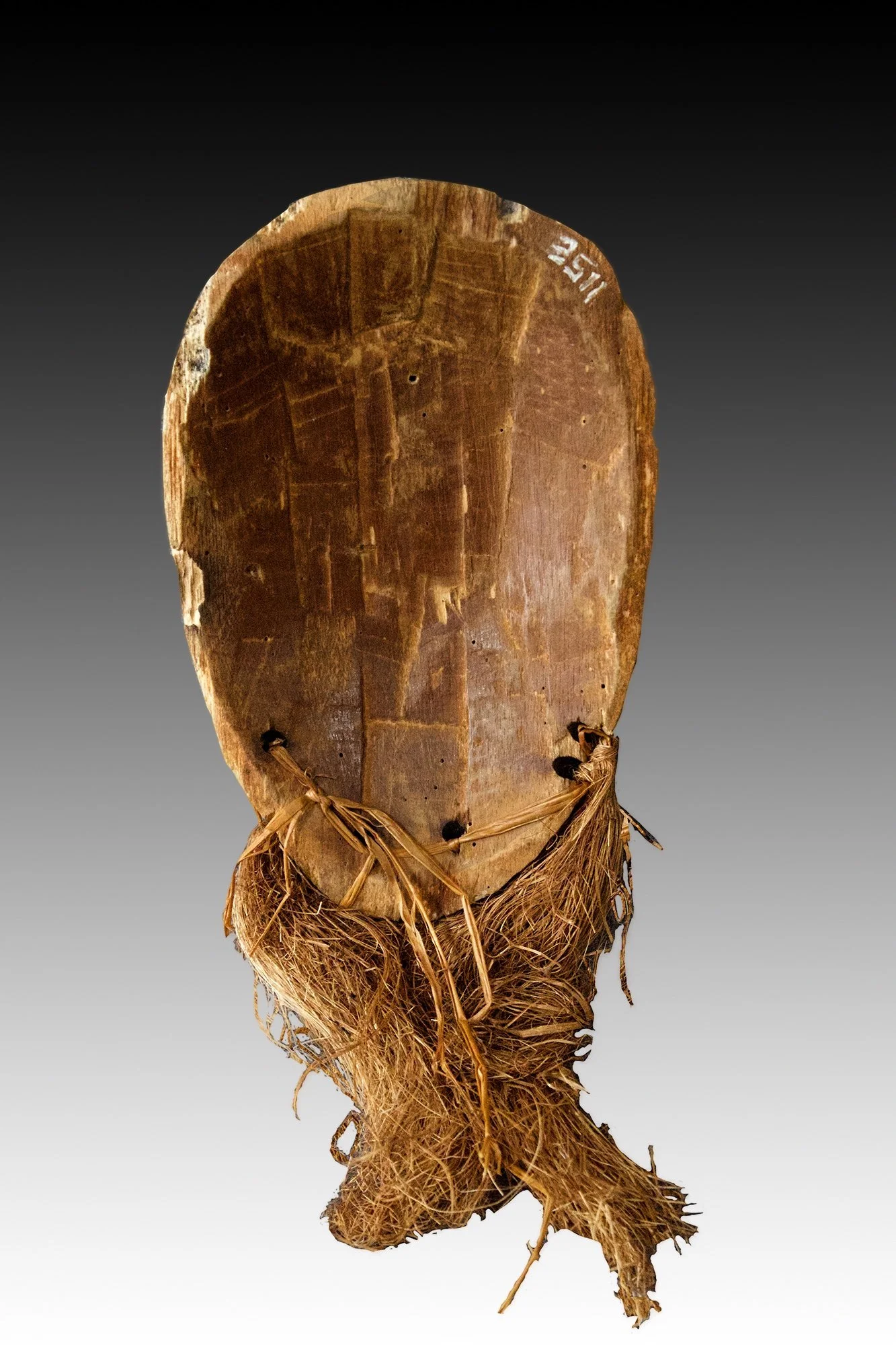 Lega mask, back view showing natural patina and raffia beard.  www.gallerytribalart.com