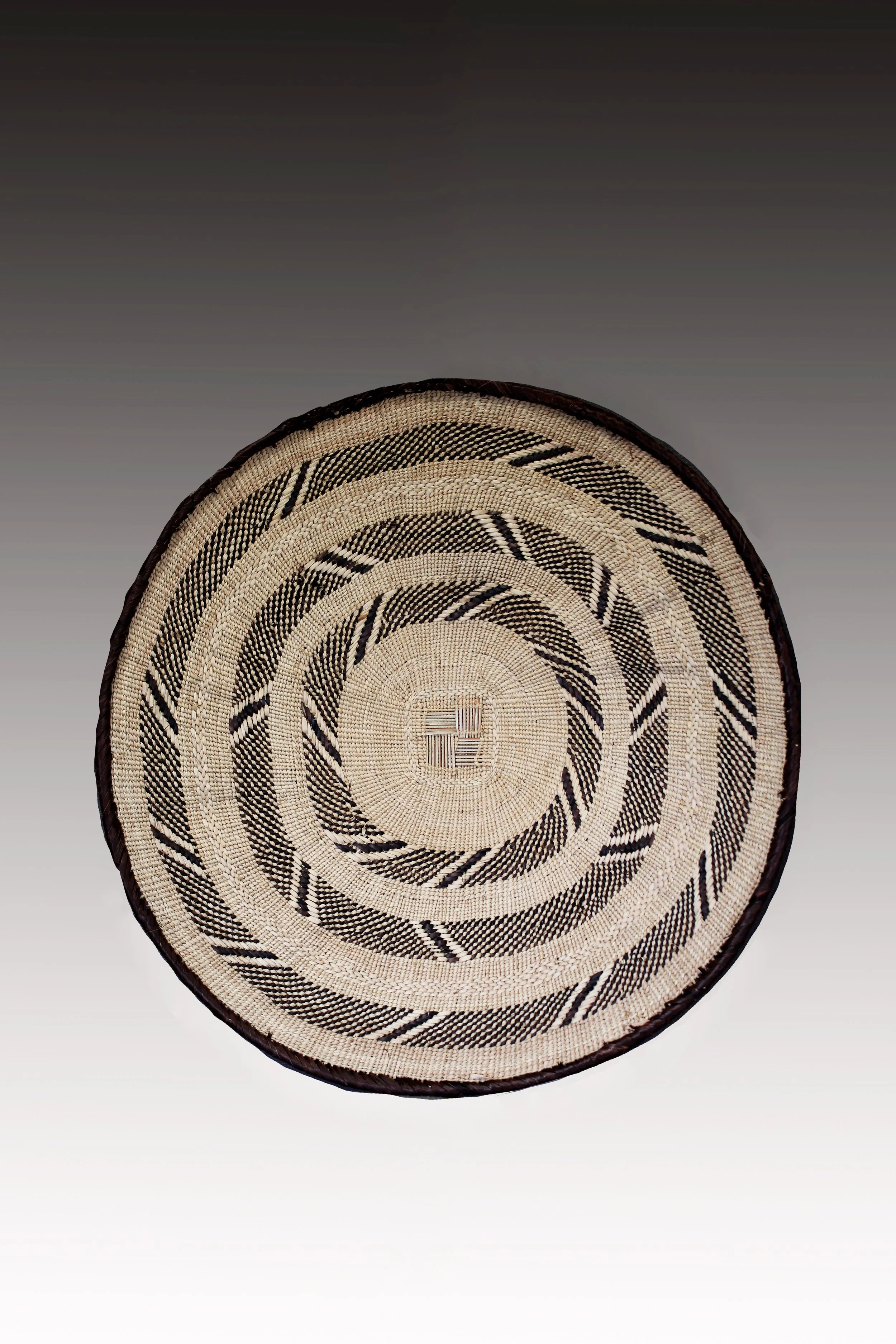Tonga basket, Zimbabwe, originally from the town of Binga, these baskets were used for winnowing grain.  www.gallerytribalart.com