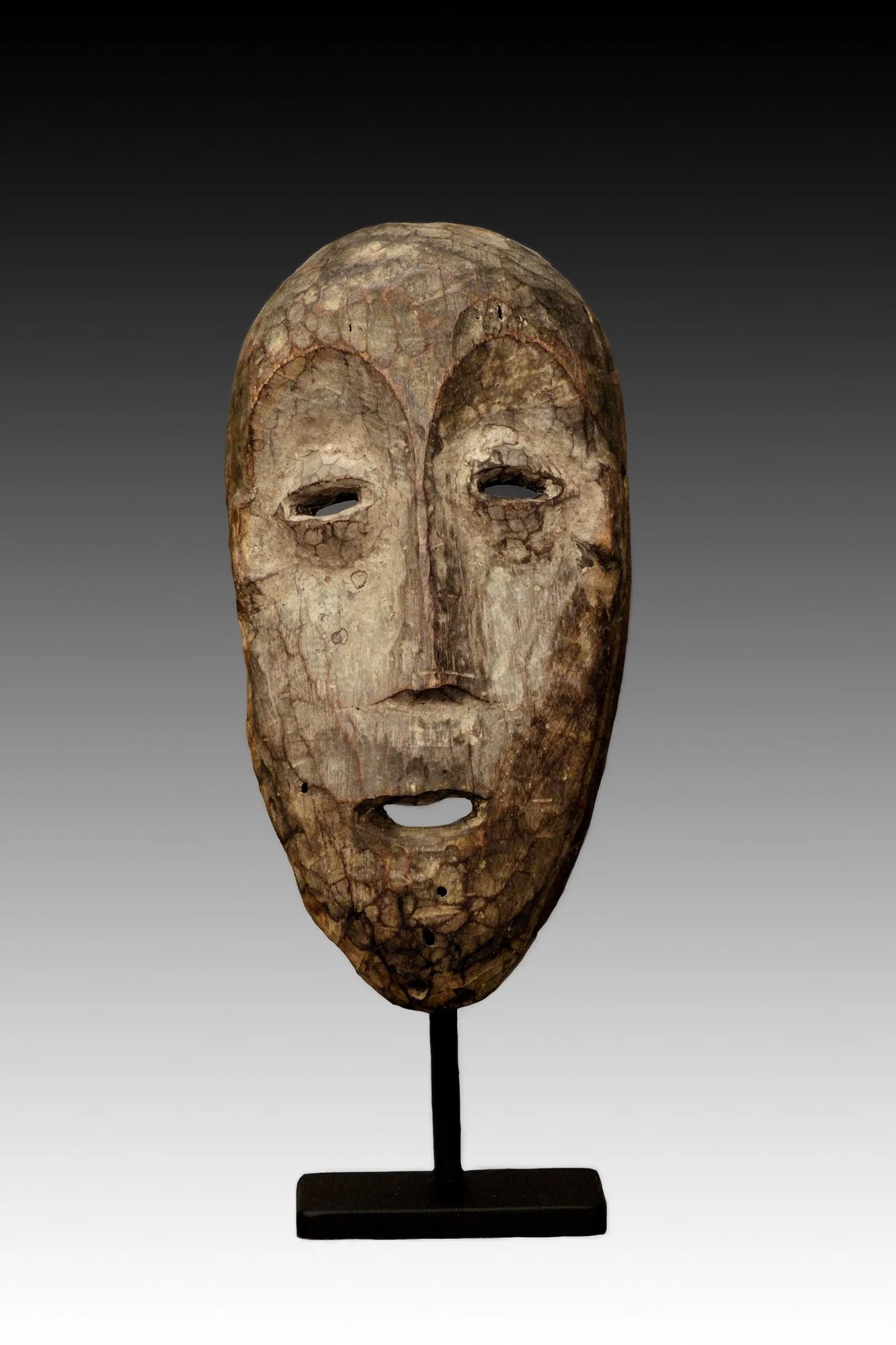 Lega mask was used in teaching principals of morality during initiation ceremonies for young boys.  www.gallerytribalart.com