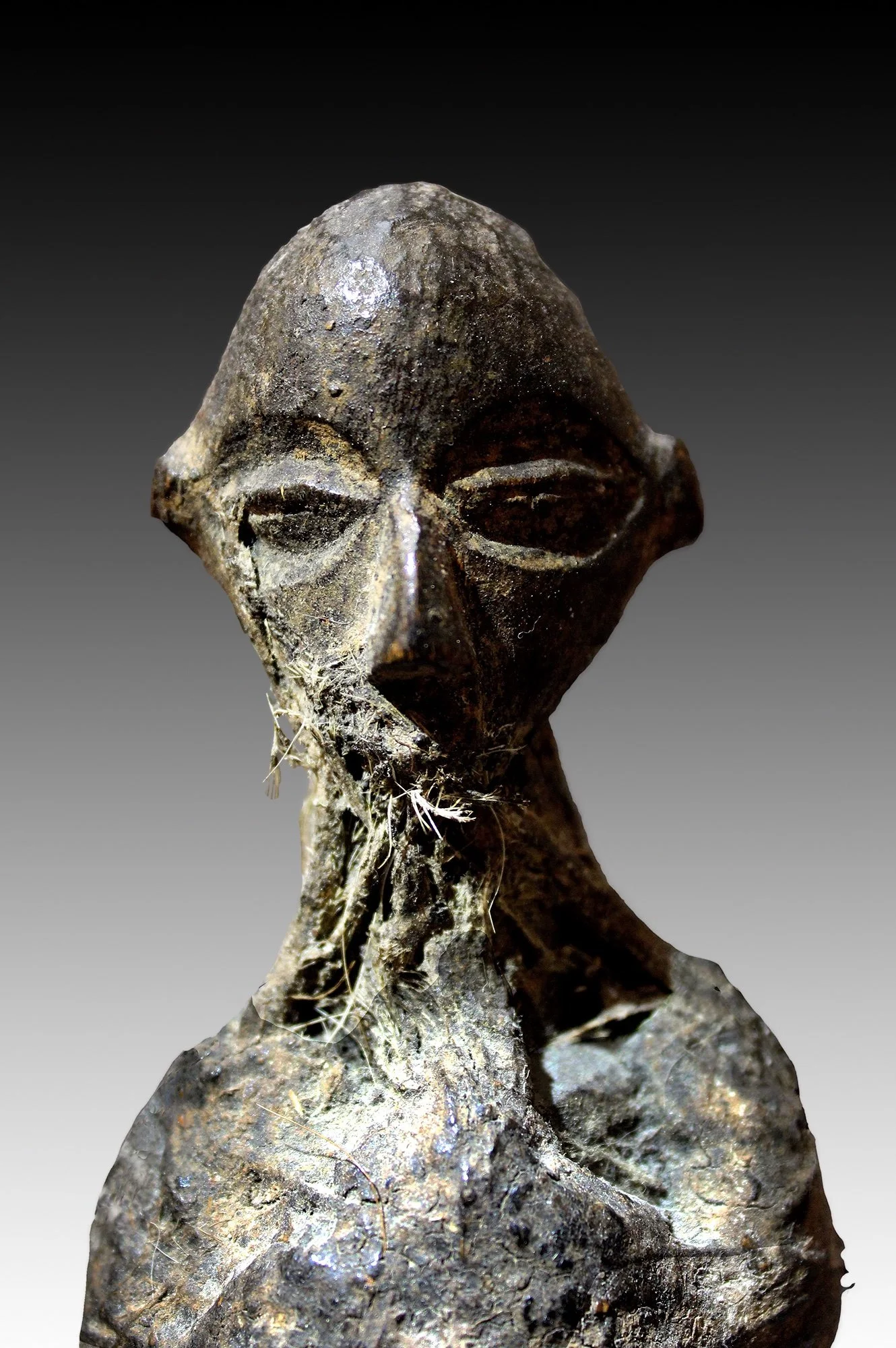 Yaka encrusted fetish figure from the Congo