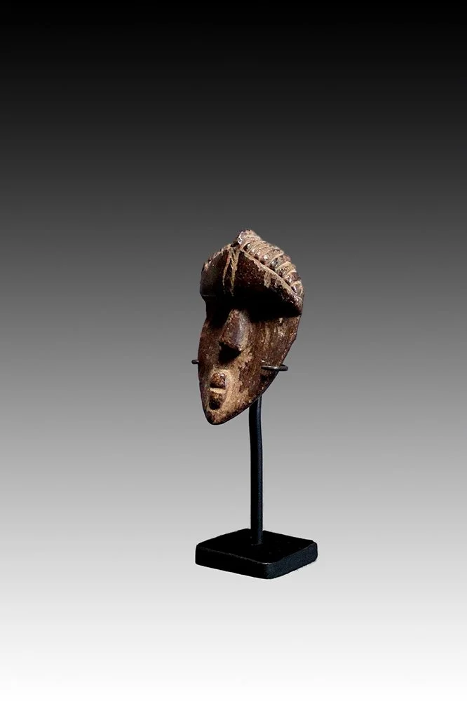Antique African miniature passport mask.  www.gallerytribalart.com