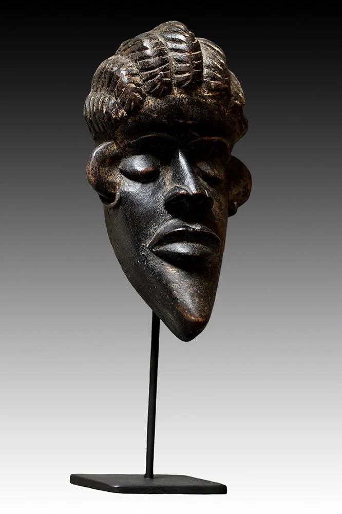 Bassa mask with arched brows, downturned eyes and wide mouth.  www.gallerytribalart.com