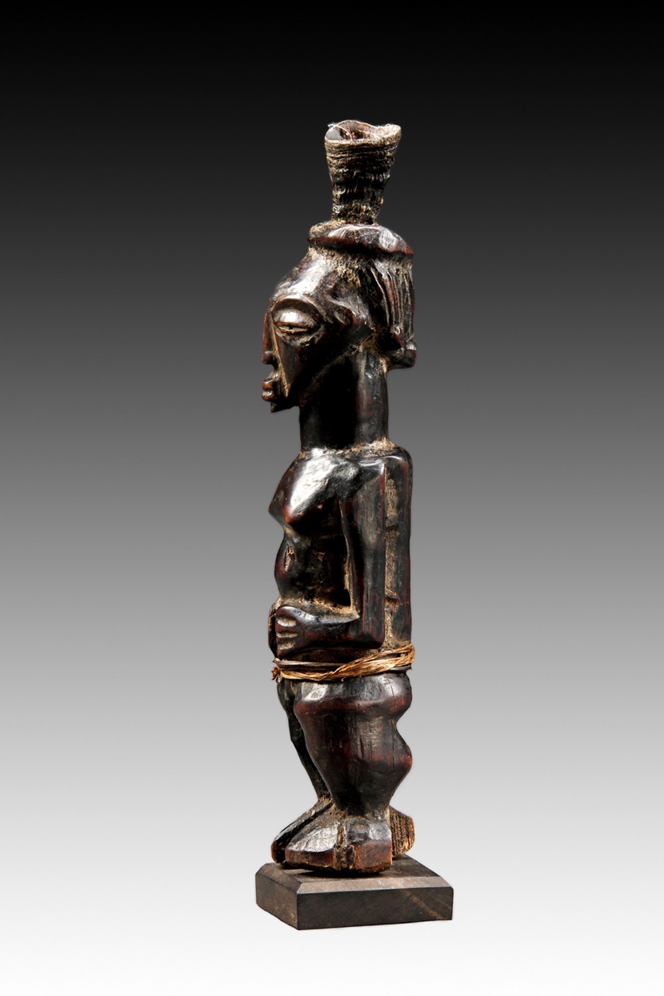Songye figure, powerful Congo sculpture with dark fine patina.  www.gallerytribalart.com