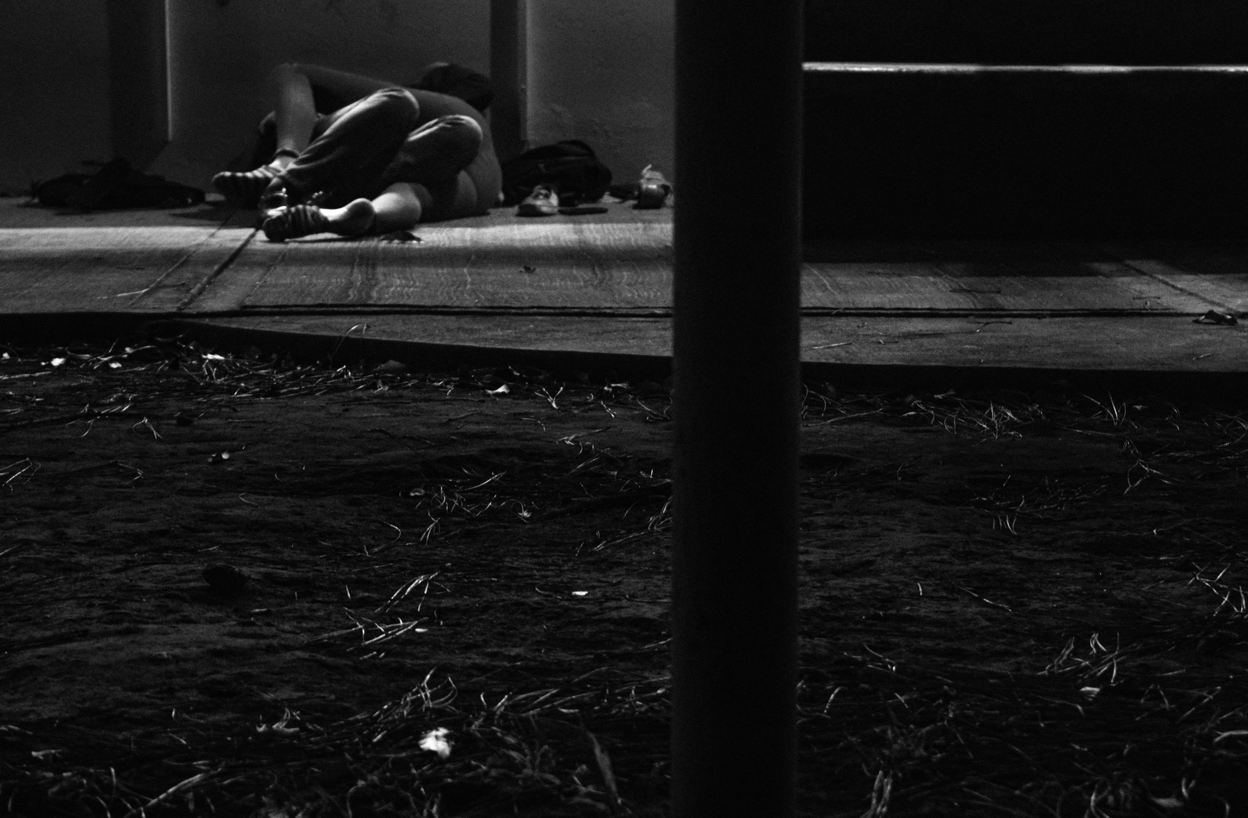 Lovers kissing passionately outside a classroom of the UCR, Costa Rica's most remarkable university.