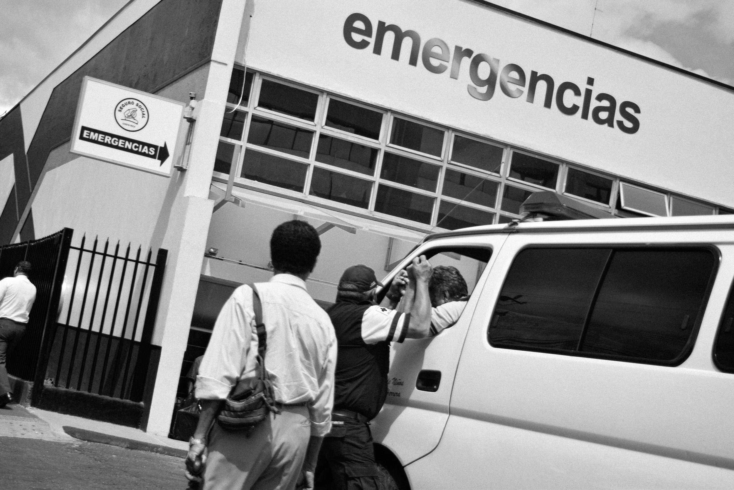 A discussion turns heated outside the ER of the San Juan de Dios hospital.