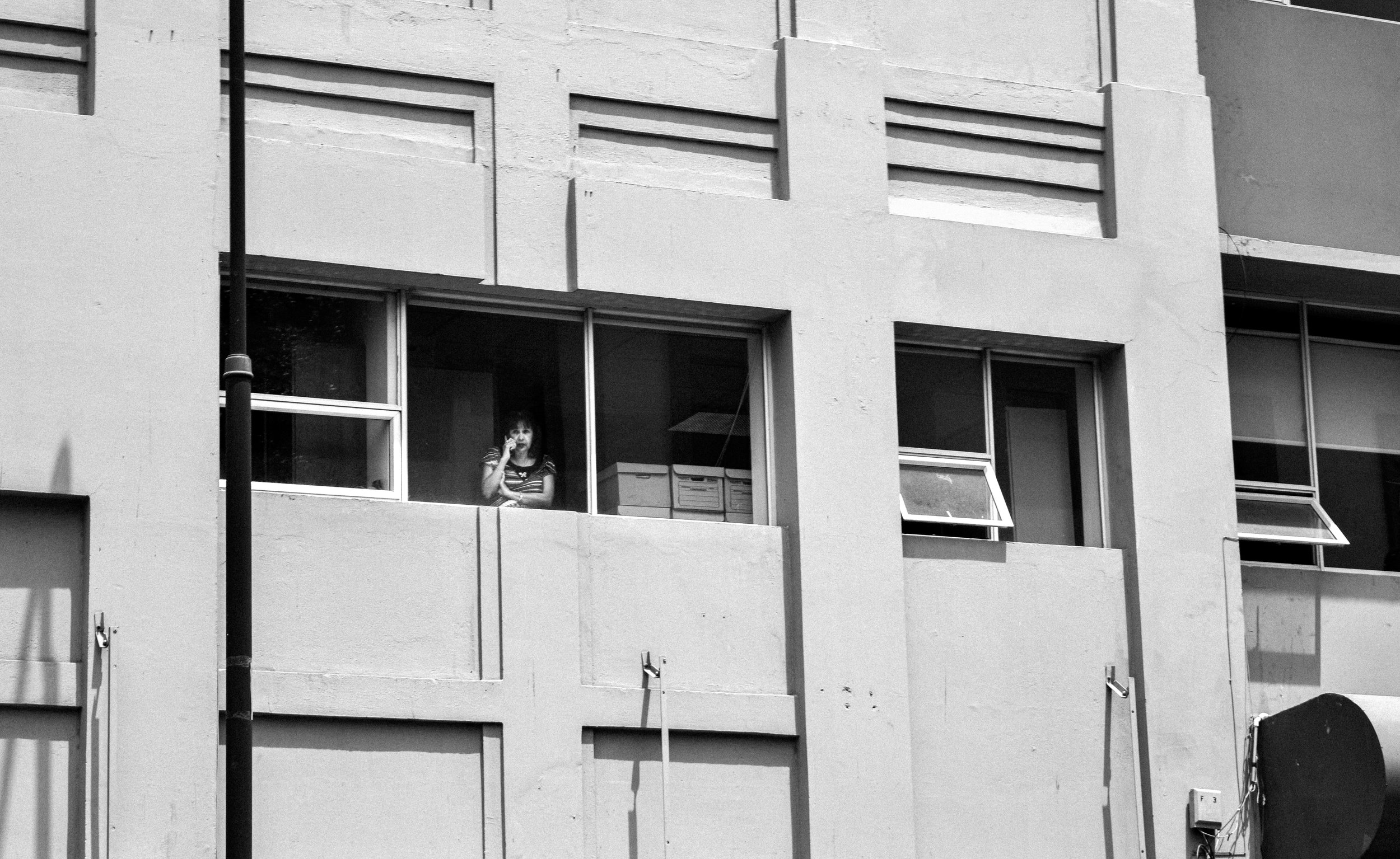 A phone call with a view outside the building of Correos de Costa Rica.