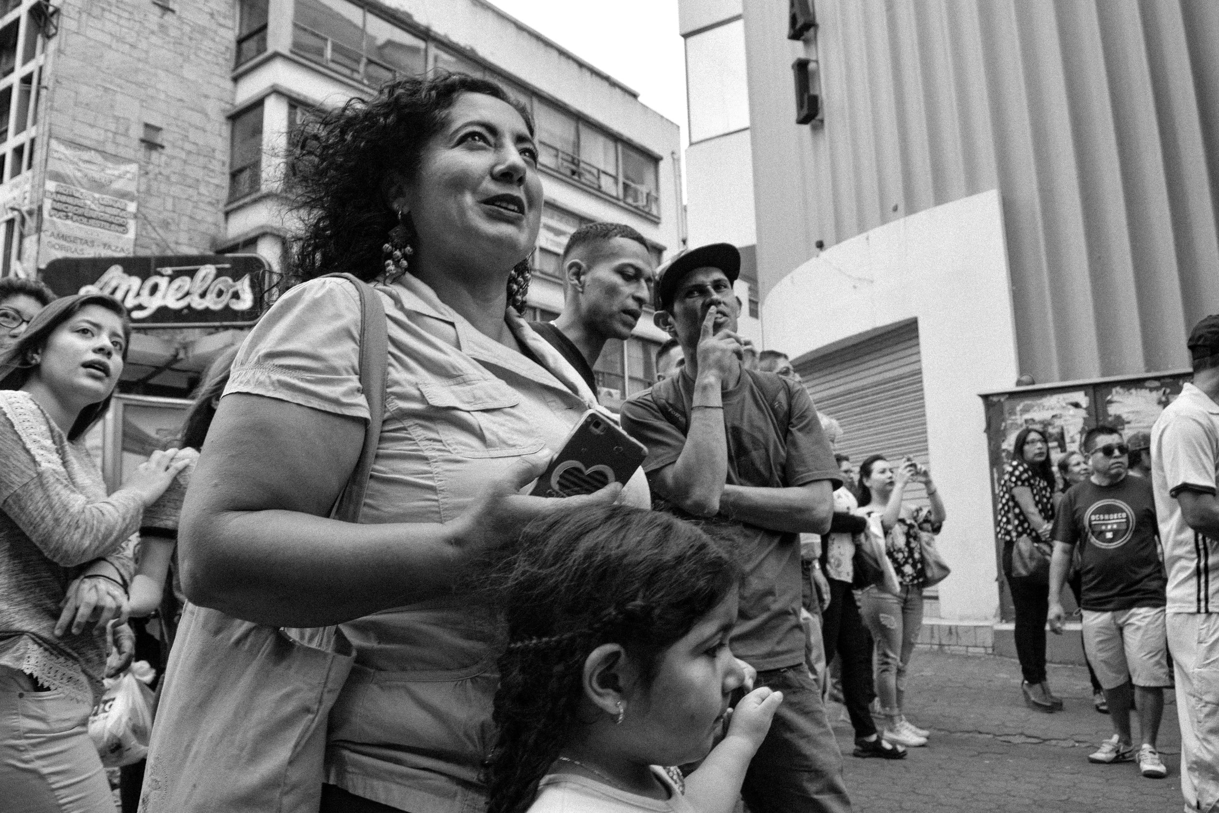Bystanders enjoying a street performance. SJ is home to over 1,482,000 residents: an estimated of 741,000 men and 741,000 women.