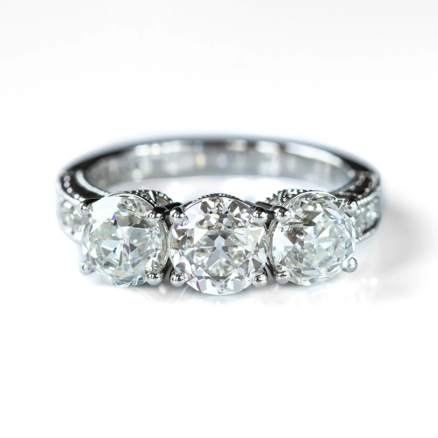 Antique Cut Three Stone Diamond Ring