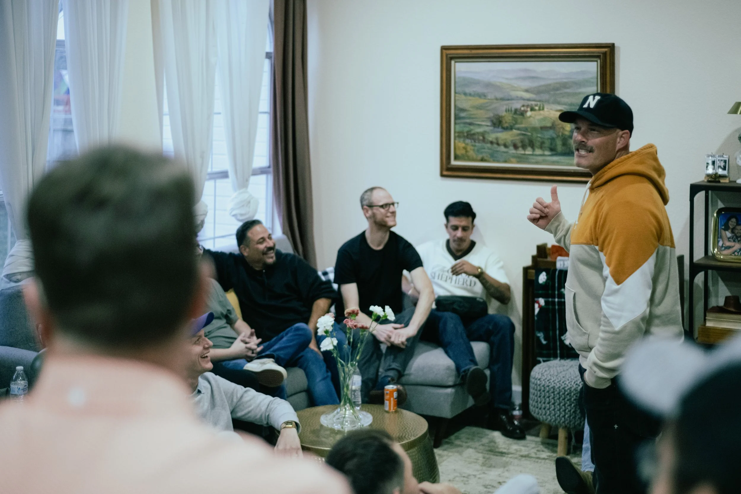 Girl holding "Welcome Home" sign