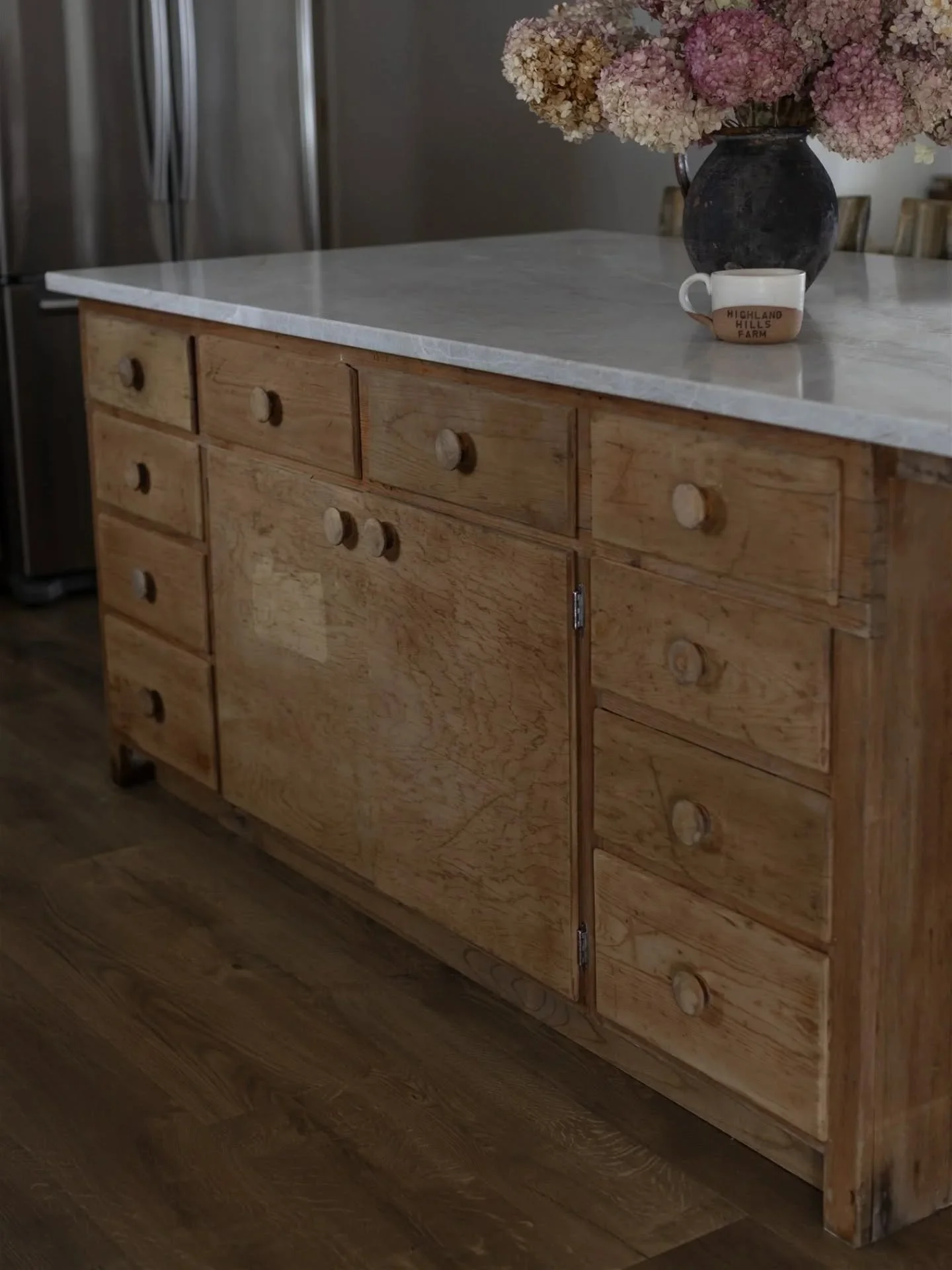 3+ years ago my parents decided to downsize and move from their house. This greasy, gross, old work bench piece was in their garage and I envisioned it as my kitchen island someday. I've been storing it in our shop and, finally, after this Christmas 