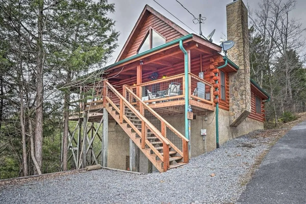Located in Douglas Lake Resort this 2-bedroom, the 2-bath cabin boasts a covered wraparound deck with views from every angle and a charcoal grill for cookouts you won&rsquo;t forget. Take a trip to Soaky Mountain Waterpark, head into Pigeon Forge to 