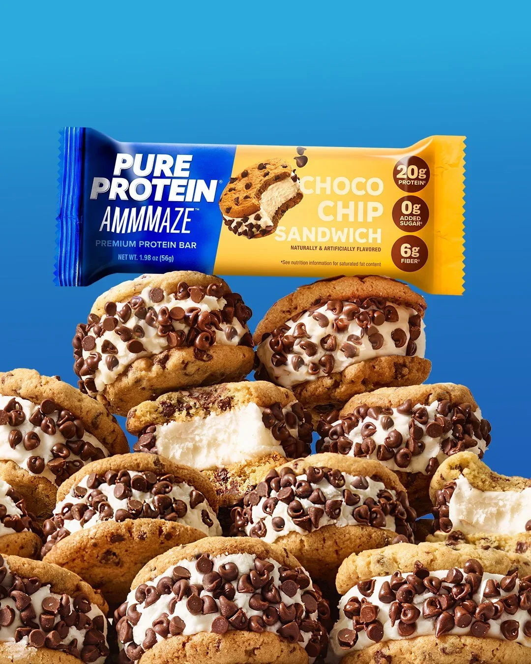 A group of chocolate chip cookies topped with white frosting and chocolate chips, with a protein bar labeled "Pure Protein AMMMAZE Choco Chip Sandwich" in the background against a blue background.