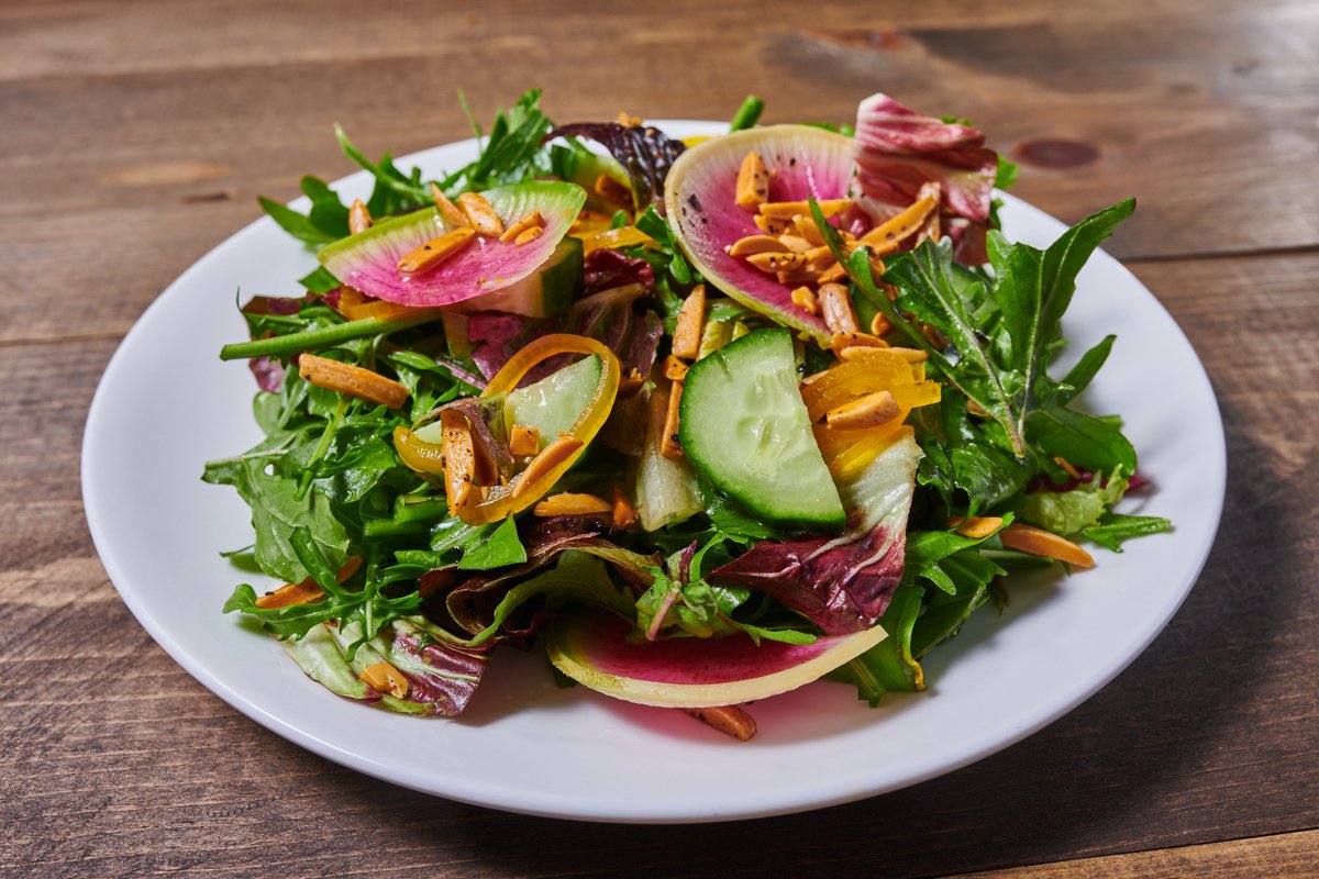 Fresh salad with watermelon radish and arugula