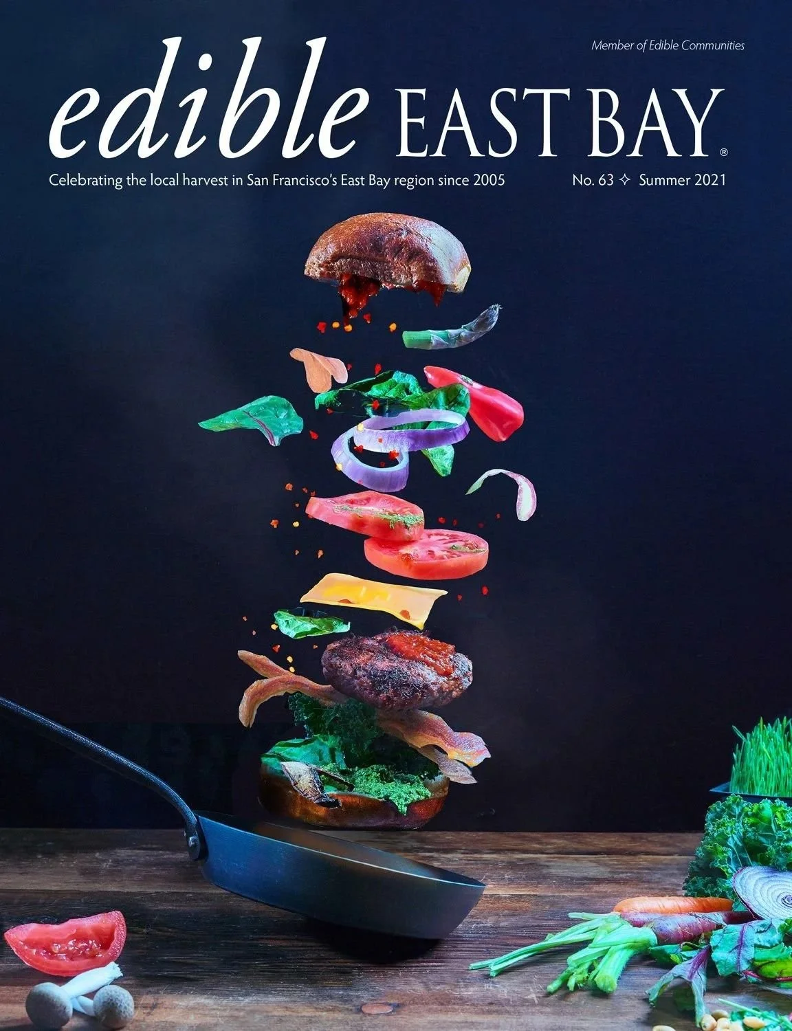 Edible East Bay magazine cover with a floating burger and toppings, editorial food photography by Judy Doherty