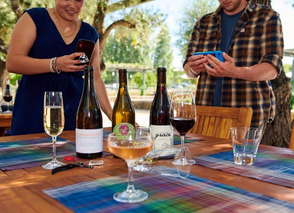 Wine tasting at an outdoor table